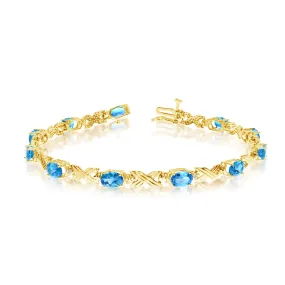 10K Yellow Gold Oval Blue Topaz Stones And Diamonds Tennis Bracelet, 7"