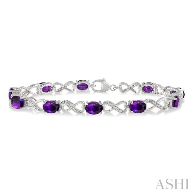 1/10 Ctw Round Cut Diamond & 7x5 MM Oval Cut Amethyst Semi Precious Infinity Bracelet in Sterling Silver