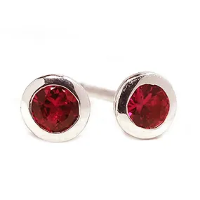 18 Karat White Gold Ruby Bezel Set Stud Earrings