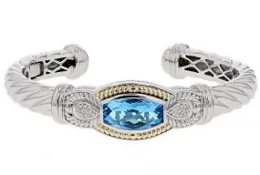 Italian Sterling Silver Bangle Bracelet set with 0.10ct diamonds, blue topaz and 14K solid yellow gold accents