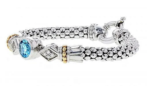 Italian Sterling Silver Bracelet with 0.31ct diamonds, blue topaz and 14K solid yellow gold accents