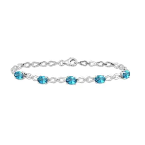 Jewelili Sterling Silver 8x6 MM Oval Shape Swiss Blue Topaz and Natural White Round Diamonds Link Bracelet